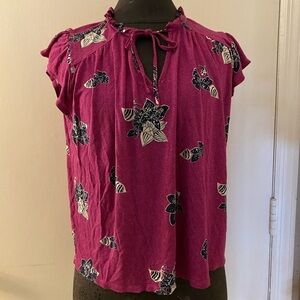 Loft sleeveless tied neckline.